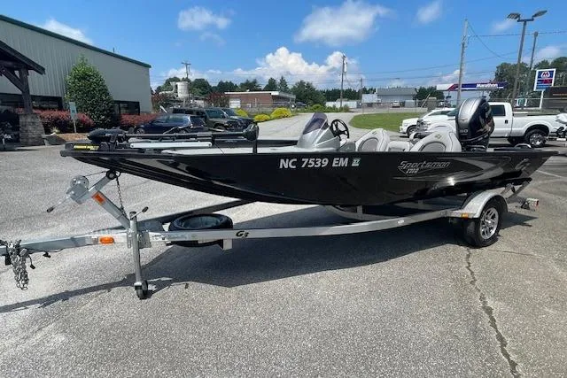 Slide: The Image of 2019 G3 Sportsman 1710 boat on trailer in parking lot, side view. - 11