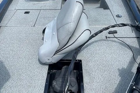 Slide: The Image of 2019 G3 Sportsman 1710 boat interior with gray seating and deck. - 6