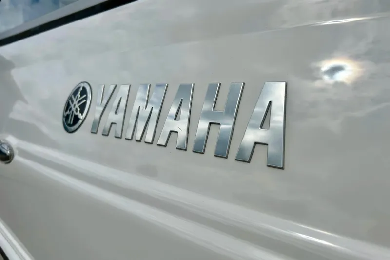 Slide: The Image of Close-up of Yamaha logo on a 2008 Searay SX 232 boat. - 4