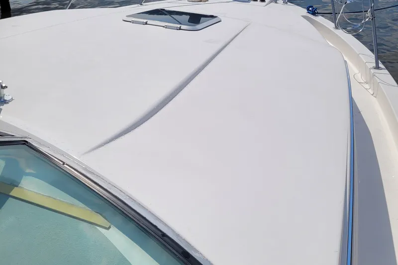 Slide: The Image of 1997 Wellcraft 330 Coastal boat deck with hatch, viewed from above. - 7