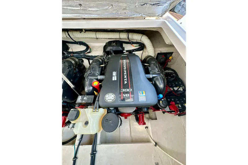Slide: The Image of Engine compartment of a 2015 Rinker 340 Express Cruiser with Volvo Penta V8 engine. - 33