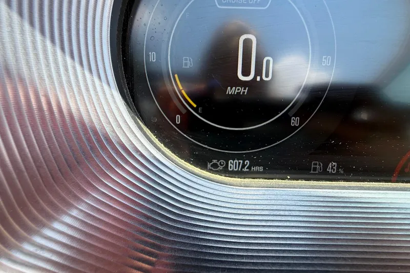 Slide: The Image of Close-up of 2019 MasterCraft X24 dashboard showing 0 MPH and 607.2 hours. - 12