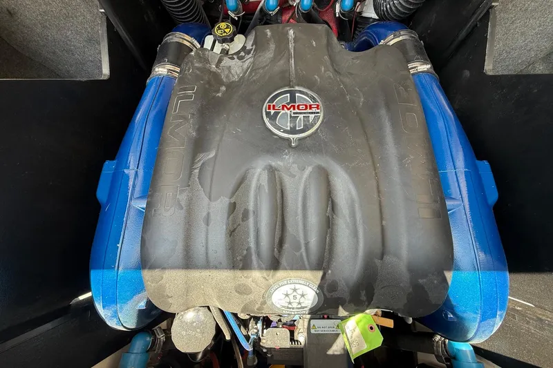Slide: The Image of Engine of a 2019 MasterCraft X24 boat with Ilmor branding. - 16