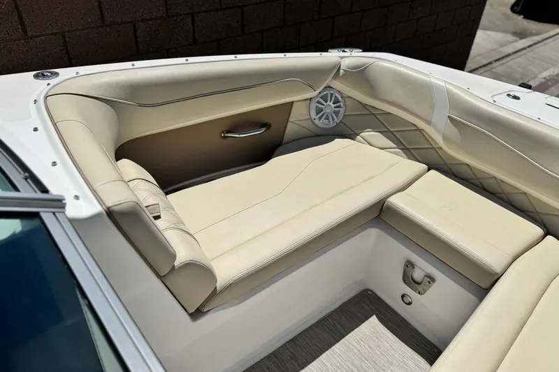 Slide: The Image of Luxurious seating area on a 2018 Regal 23 OBX boat with beige upholstery. - 11