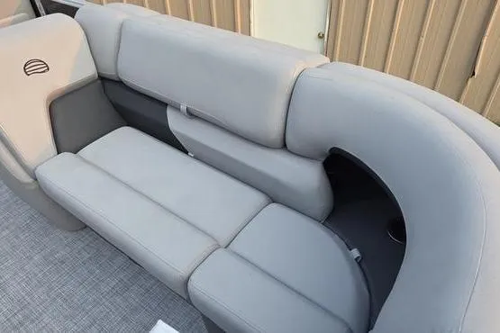 Slide: The Image of 2026 Sun Tracker PB 20 DLX boat interior with gray cushioned seating. - 10