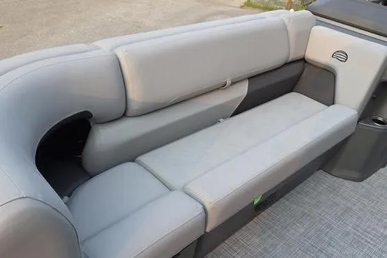Slide: The Image of 2026 Sun Tracker PB 20 DLX boat interior with gray cushioned seating. - 3