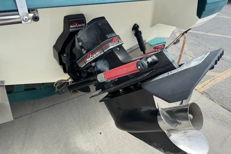 Slide: The Image of MerCruiser Bravo One outdrive on a 1995 Celebrity 220 BR boat. - 13