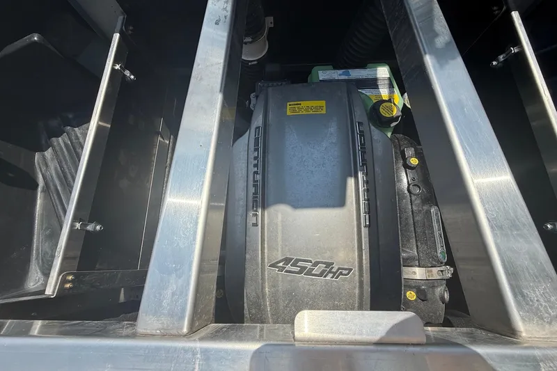 Slide: The Image of 2022 Centurion Ri245 engine compartment showcasing 450 horsepower engine components. - 16