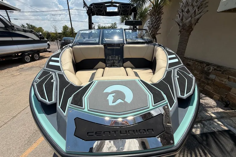 Slide: The Image of 2022 Centurion Ri245 boat with sleek design and luxurious seating. - 3