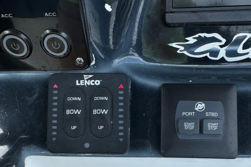 Slide: The Image of Control panel of a 2015 Glasstream 280 ZS boat with Lenco trim tabs. - 11