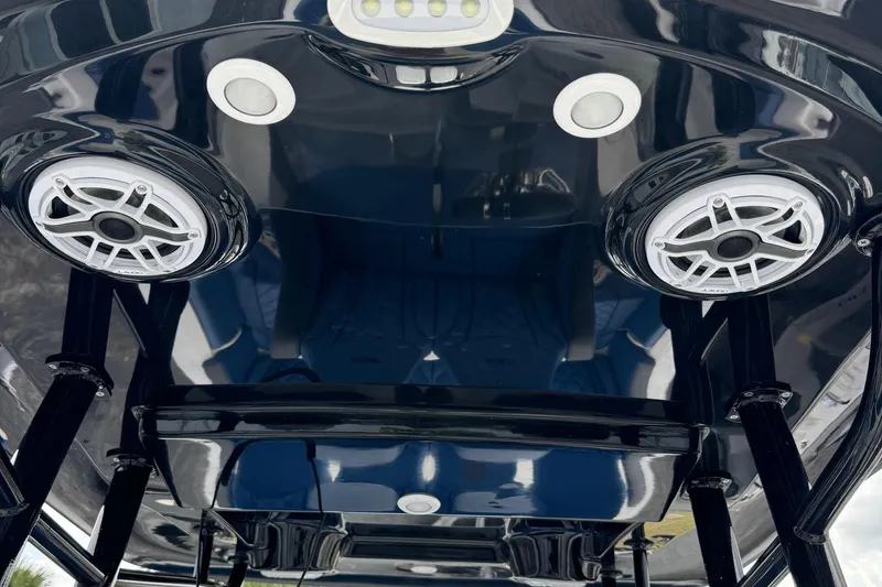 Slide: The Image of 2015 Glasstream 280 ZS boat speakers and lights on glossy black surface. - 24
