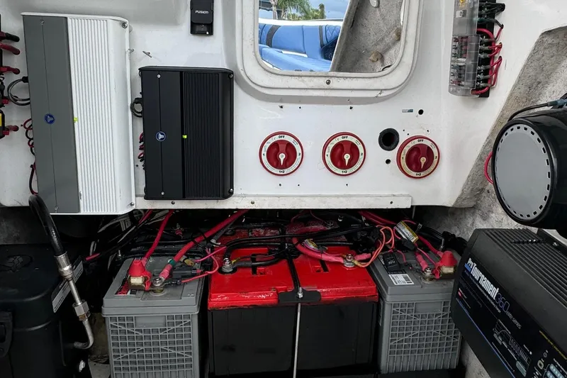 Slide: The Image of Electrical system of a 2015 Glasstream 280 ZS boat, featuring batteries and control panels. - 33