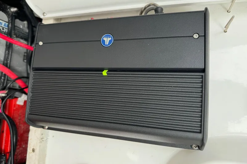 Slide: The Image of Black electronic device in a 2015 Glasstream 280 ZS boat interior. - 36