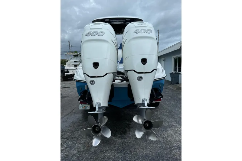 Slide: The Image of 2015 Glasstream 280 ZS boat with dual 400 horsepower outboard engines, rear view. - 50