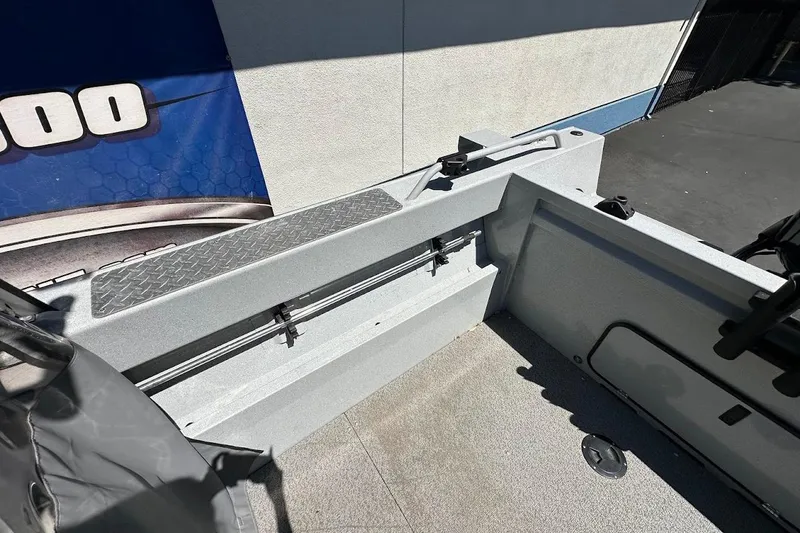 Slide: The Image of Interior view of a 2017 Duckworth 18 Advantage boat, showcasing seating and storage area. - 13