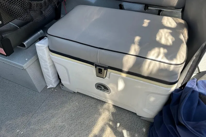 Slide: The Image of 2017 Duckworth 18 Advantage boat interior with Igloo cooler and cushioned seat. - 20