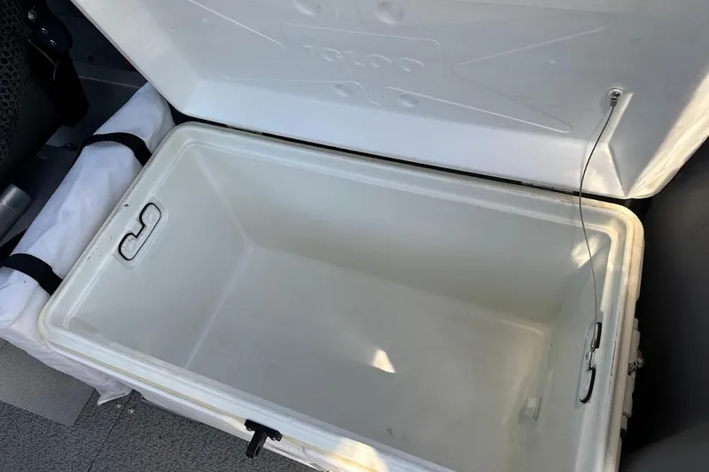 Slide: The Image of Open Igloo cooler inside a 2017 Duckworth 18 Advantage boat. - 21