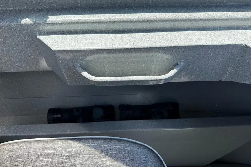 Slide: The Image of Interior detail of a 2017 Duckworth 18 Advantage boat, featuring a storage compartment. - 31