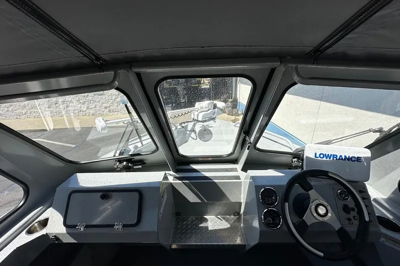 Slide: The Image of Interior view of 2017 Duckworth 18 Advantage boat cockpit with Lowrance navigation system. - 32