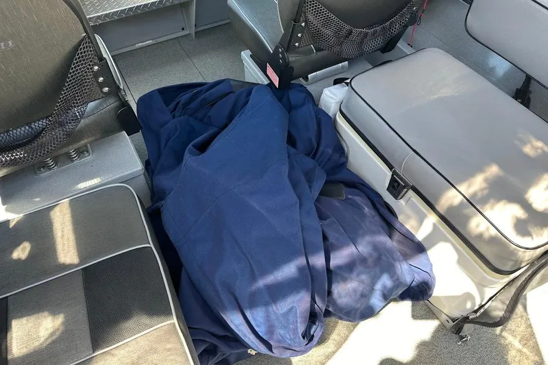 Slide: The Image of Interior of a 2017 Duckworth 18 Advantage boat with blue fabric and seating. - 34