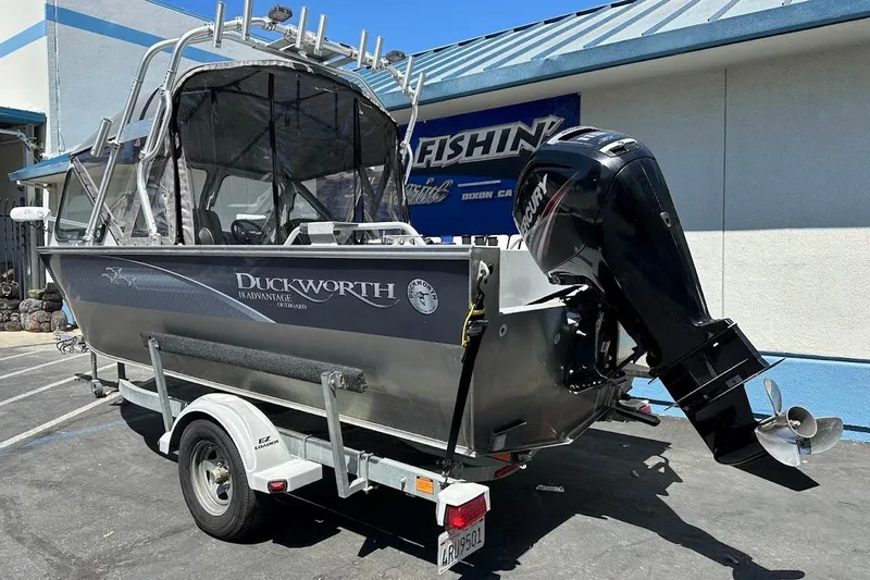 Slide: The Image of 2017 Duckworth 18 Advantage boat on trailer with Mercury outboard motor. - 8