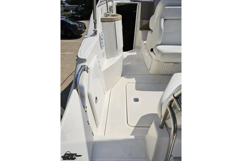 Slide: The Image of 2003 Regal Commodore 2665 boat interior with seating and storage compartments. - 36