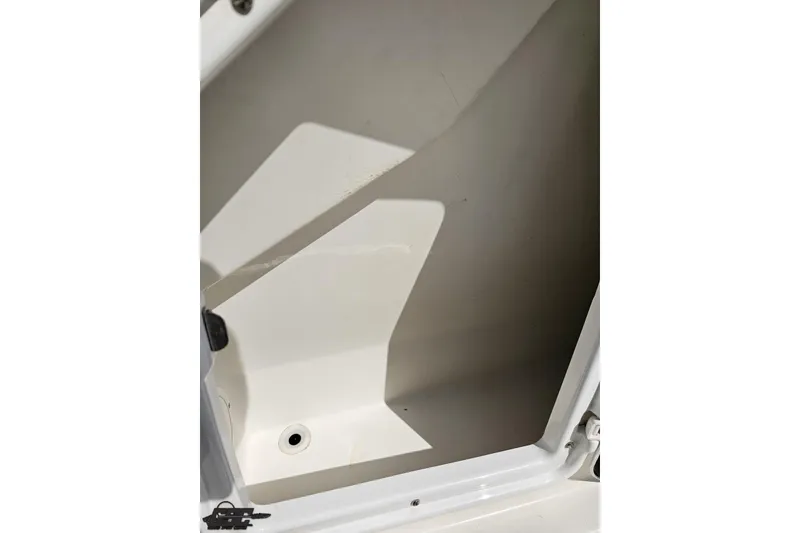 Slide: The Image of Storage compartment of 2003 Regal Commodore 2665 boat, featuring clean interior design. - 43