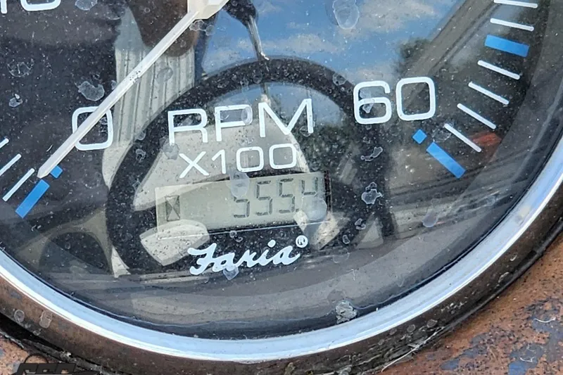 Slide: The Image of Close-up of a Faria tachometer showing 353.4 RPM on a Regal Commodore 2665. - 50