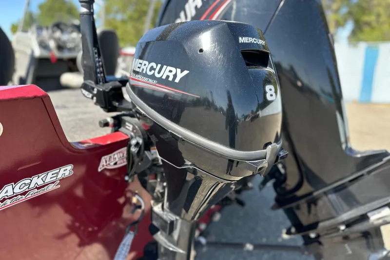 Slide: The Image of 2018 Tracker Pro Guide V-175 WT with Mercury outboard motor, close-up view. - 13