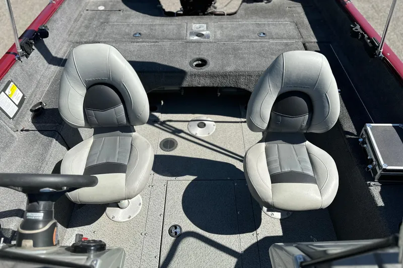 Slide: The Image of 2018 Tracker Pro Guide V-175 WT boat interior with two gray seats. - 5