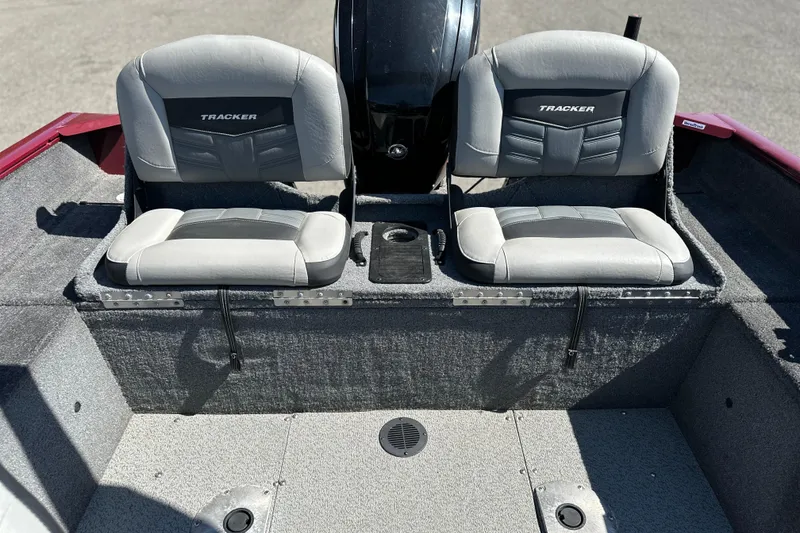 Slide: The Image of 2018 Tracker Pro Guide V-175 WT boat interior with two cushioned seats. - 7