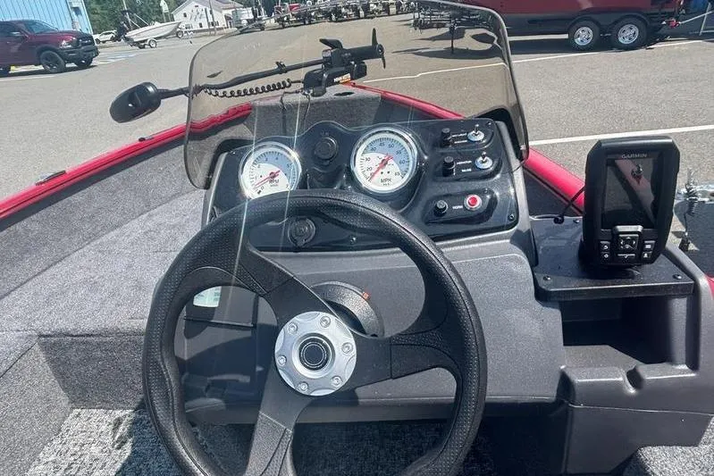 Slide: The Image of Steering console of 2026 Tracker SG V16 SC boat with gauges and GPS device. - 10