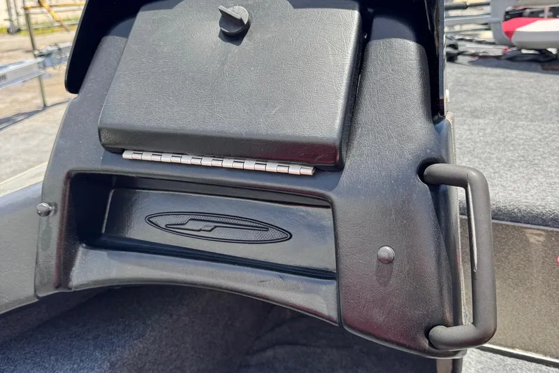 Slide: The Image of 1999 Skeeter ZX 195 boat dashboard detail with storage compartment and handle. - 11