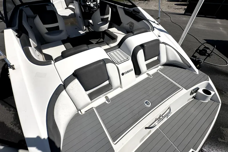 Slide: The Image of 2020 Yamaha Boats SX210 interior with sleek seating and modern design. - 12