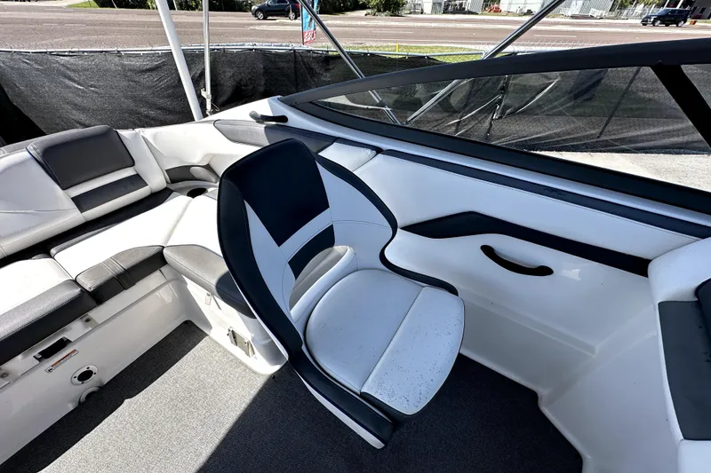 Slide: The Image of 2020 Yamaha Boats SX210 interior with sleek seating and modern design. - 33