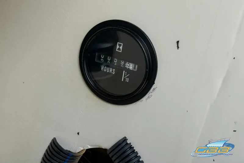 Slide: The Image of Hour meter on 2018 Bayliner VR5 Bowrider I/O boat dashboard. - 18