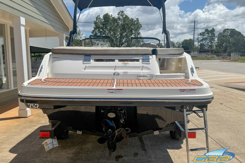 Slide: The Image of 2018 Bayliner VR5 Bowrider I/O boat, rear view with swim platform and ladder. - 8