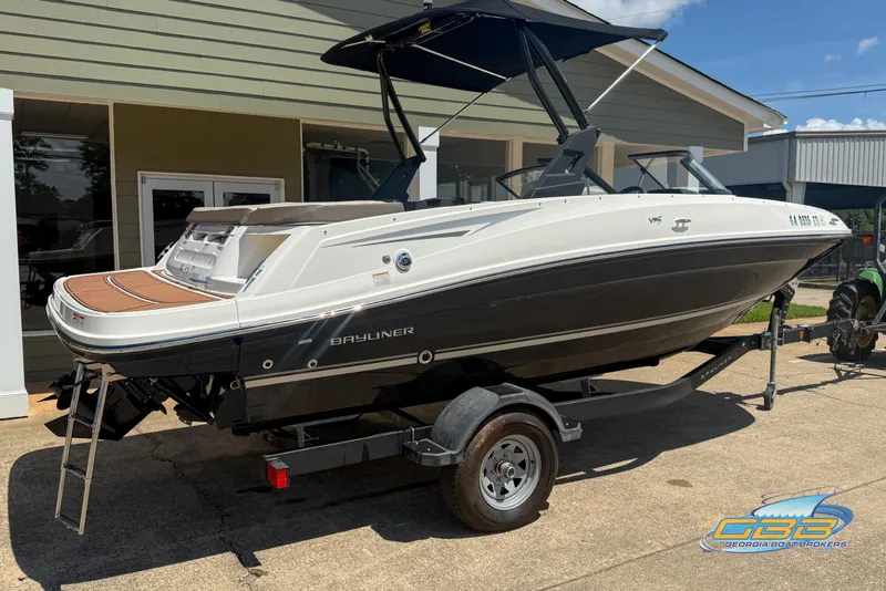 Slide: The Image of 2018 Bayliner VR5 Bowrider I/O on trailer, parked outdoors, side view. - 9