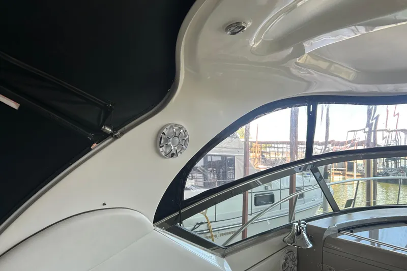 Slide: The Image of Interior view of 2006 Sea Ray 380 Sundancer boat with speaker and window. - 16