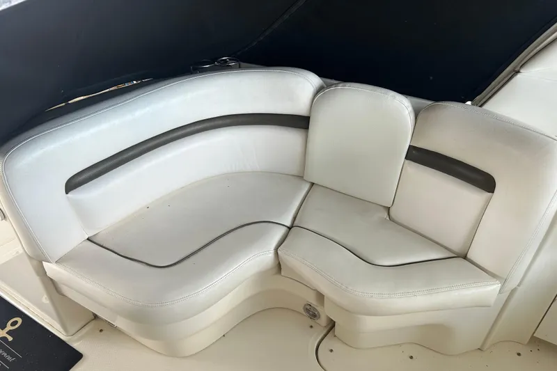 Slide: The Image of White leather seating on a 2006 Sea Ray 380 Sundancer boat. - 20