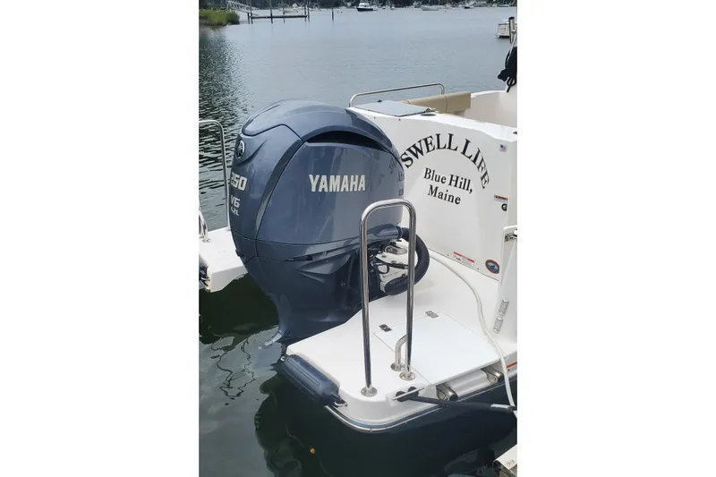 Slide: The Image of 2021 Ranger Tugs R-25 with Yamaha outboard motor, docked in Blue Hill, Maine. - 8