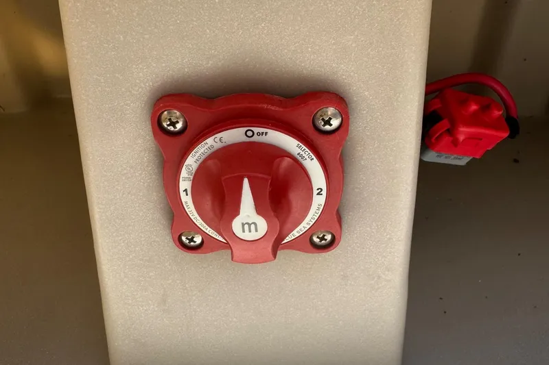 Slide: The Image of Red battery selector switch on 2013 SouthWind 229 L boat. - 14