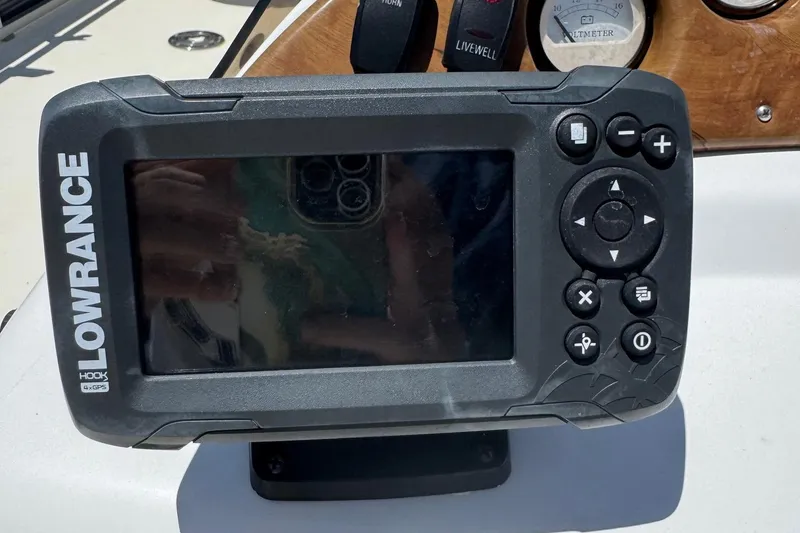 Slide: The Image of Lowrance Hook 4x GPS device on 2013 SouthWind 229 L boat dashboard. - 7