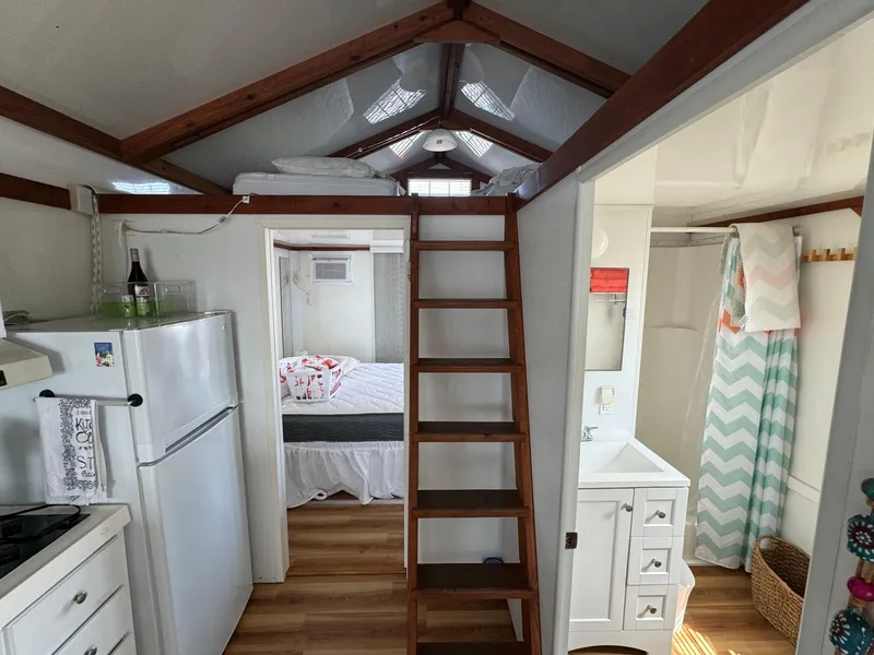 Slide: The Image of Interior of 2009 Catamaran Cruisers Aqua Lodge with loft, kitchen, and bathroom. - 10