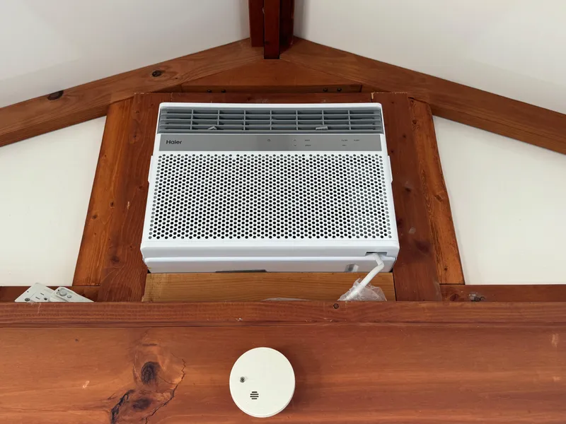 Slide: The Image of Wall-mounted air conditioner in 2009 Catamaran Cruisers Aqua Lodge, wooden interior ceiling. - 15