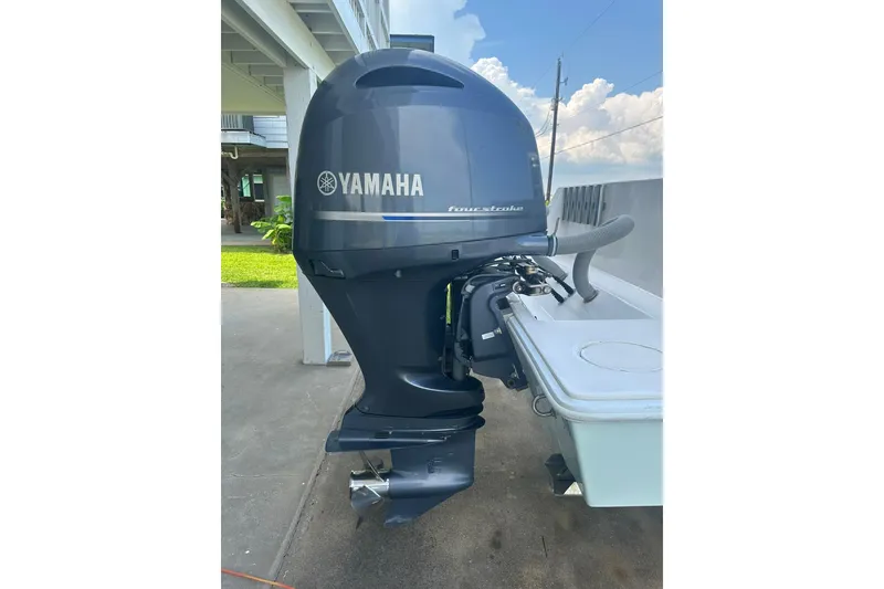 Slide: The Image of Yamaha four-stroke outboard motor on 2013 Contender 25 Tournament boat. - 20