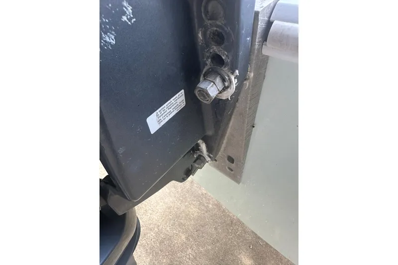 Slide: The Image of Close-up of a 2013 Contender 25 Tournament boat engine mount detail. - 24