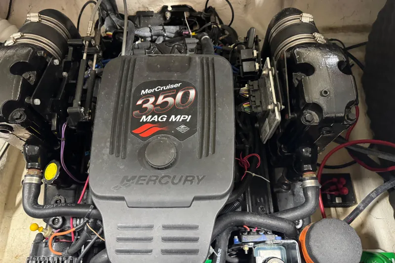 Slide: The Image of MerCruiser 350 MAG MPI engine in 2006 Rinker 246 boat. - 19