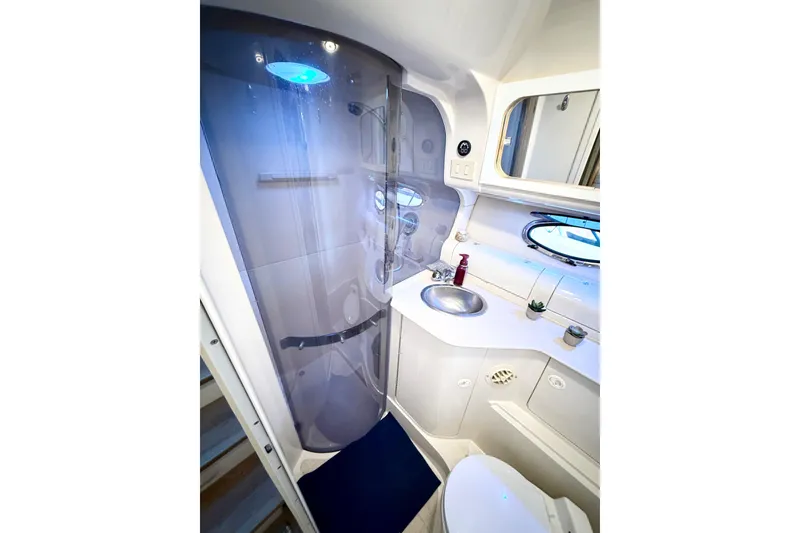 Slide: The Image of Luxurious bathroom in 1998 Regal Commodore 402 yacht with modern shower and sleek design. - 27