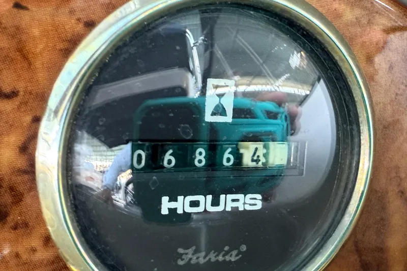 Slide: The Image of Hour meter reading 6864 on a 1998 Regal Commodore 402 boat. - 38